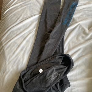 Like new. Fuzzy warm Reebok full length leggings. Logo on side